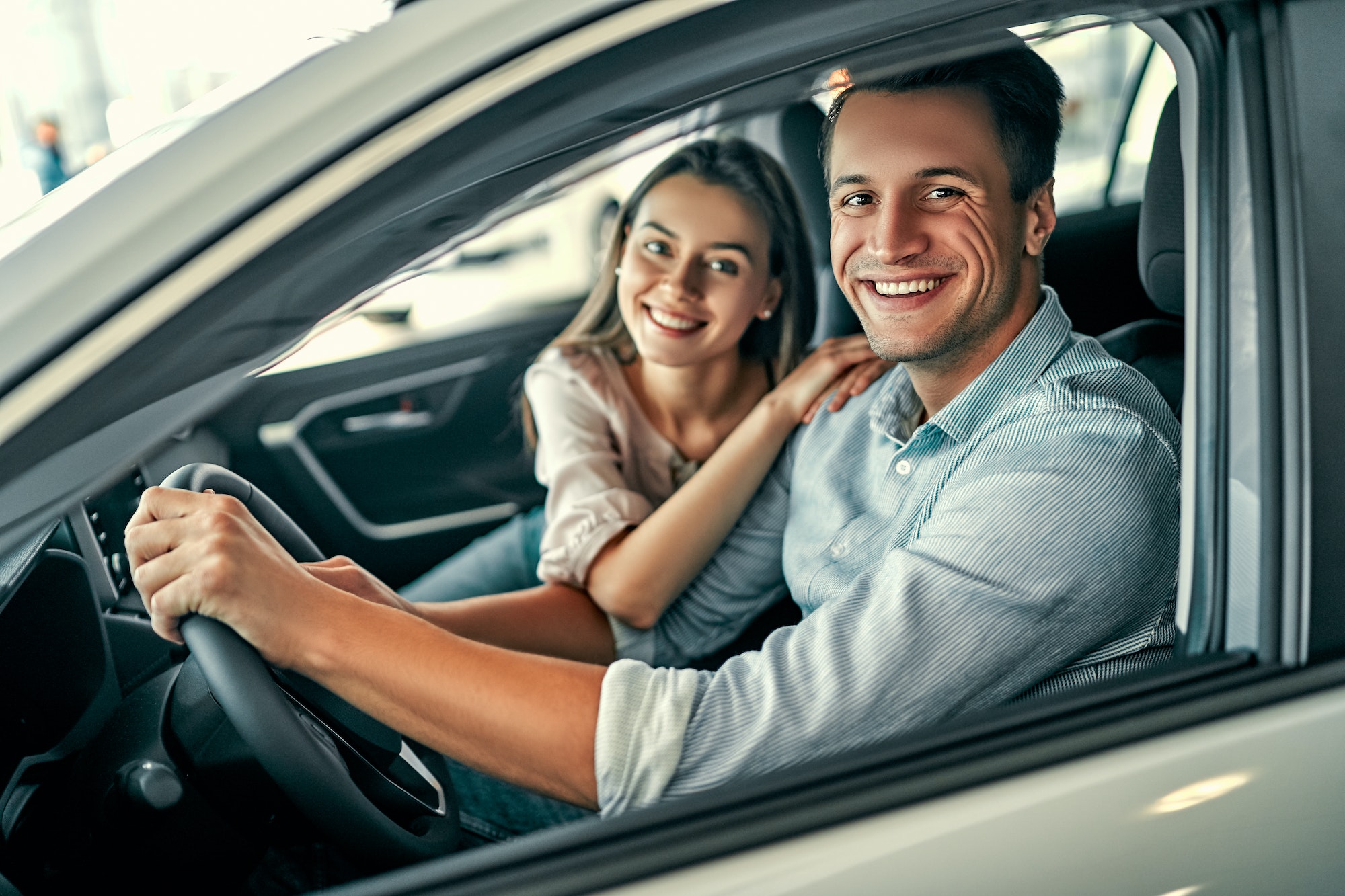 At a car dealership, buying a car